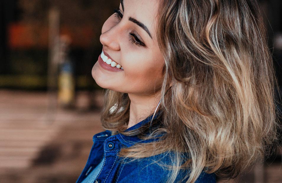 woman smiling after her dental appointment at Everbright Dental