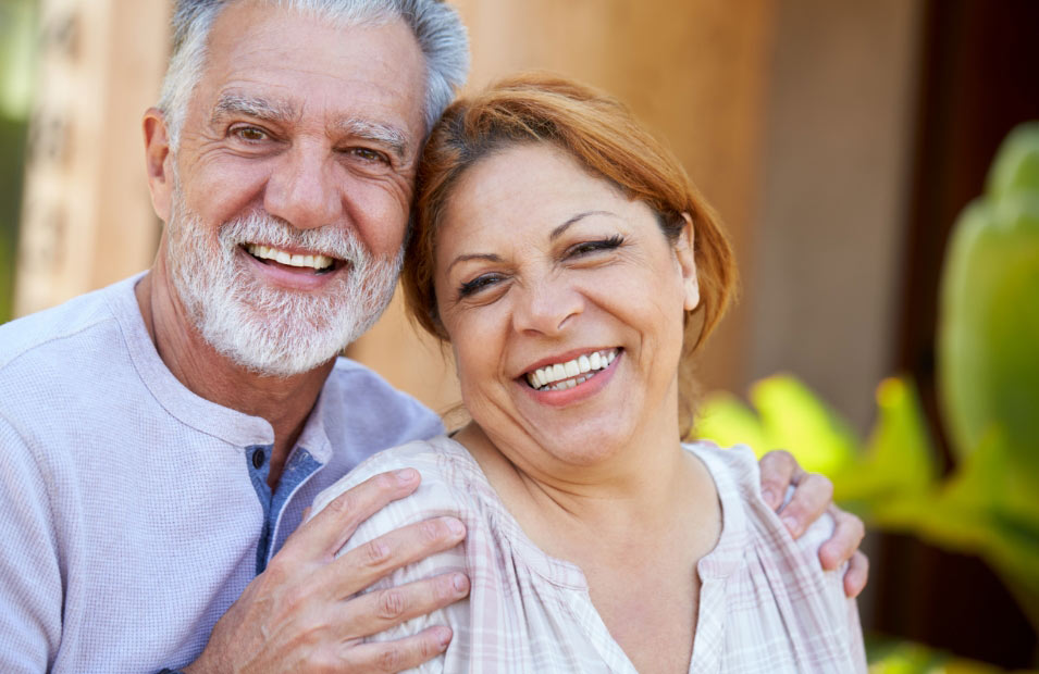 couple smiling after their dental appointment at Everbright Dental